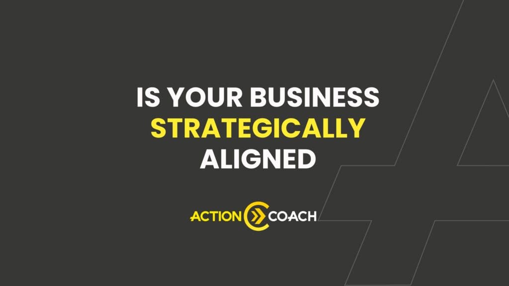 Text graphic with the message Is your business strategically aligned in bold white and yellow letters, above the yellow and white ActionCOACH logo, all on a dark gray background—spotlighting Business Coaching for real ROI meaning.