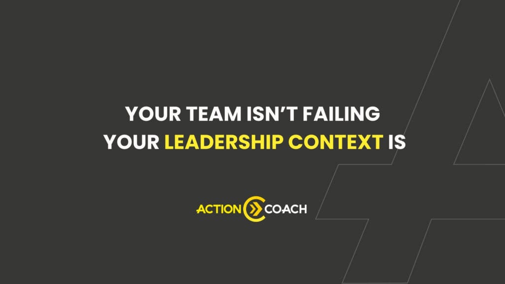 A dark grey background with the text “Your team isn’t failing, your leadership context is” in white and yellow. Below, the ActionCOACH logo appears in yellow and white, highlighting the value of business coaching. Geometric line accents decorate the background.