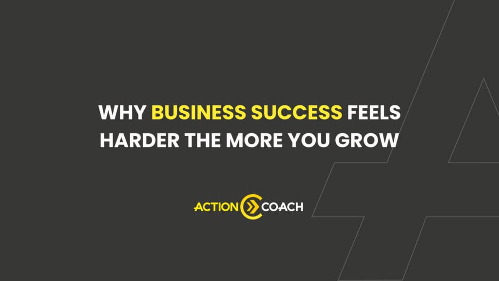 Dark grey background with the text: Why business success feels harder the more you grow in white and yellow. Below is the ActionCOACH logo in yellow and white. Geometric lines decorate the bottom right corner, reflecting business strategy.